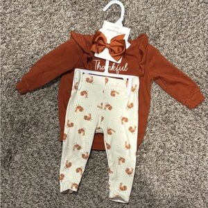Rust Long Sleeve Baby Outfit with Cream Floral Pants
